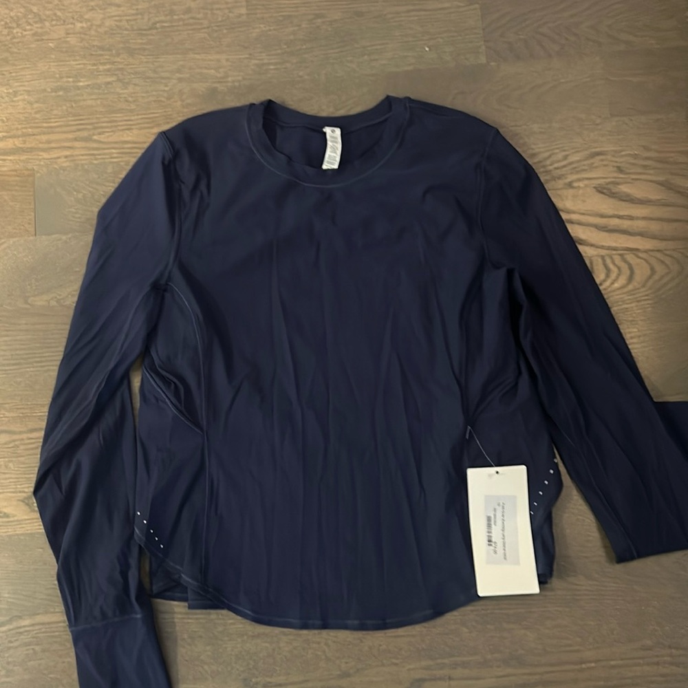 New with tags folded over running long sleeve
